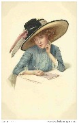 Jeune femme rêveuse écrivant une lettre