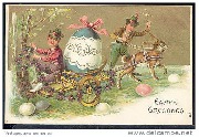 Easter  Greetings (gros oeuf de Pâques sur un chariot tiré par un lièvre)