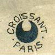 Croissant et Paris en majuscules entourant un croissant noir