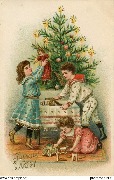 Joyeux Noël (enfants trouvant des jouets dans le sapin)