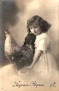 Joyeuses  Pâques (fillette portant une poule )